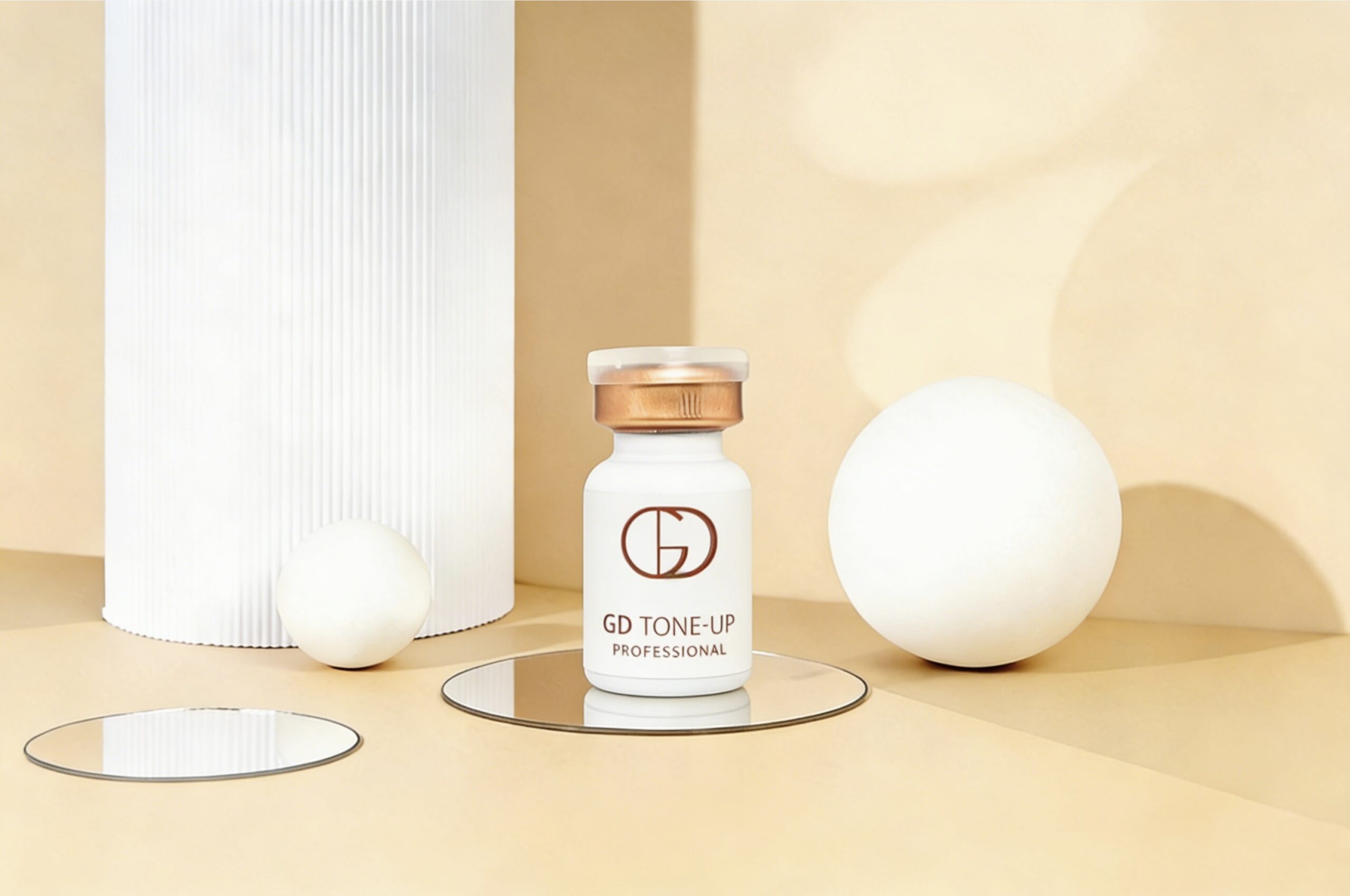 GD Tone-Up Professional skincare vial displayed on a beige product setup